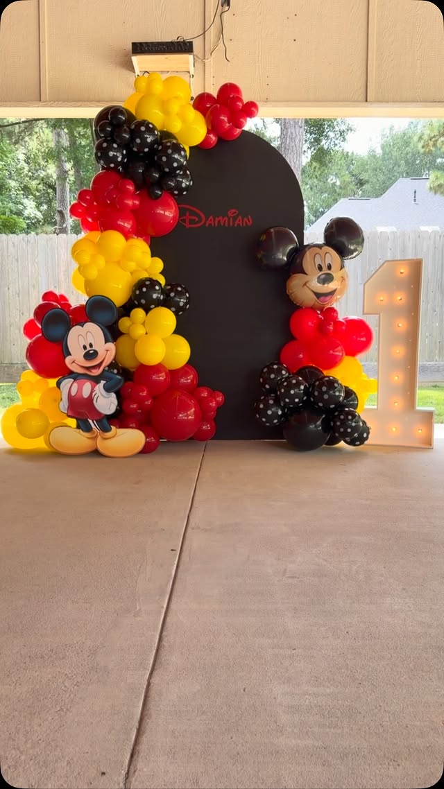 Mickey Mouse first birthday balloon backdrop by Lovely Pop Luxury Events
