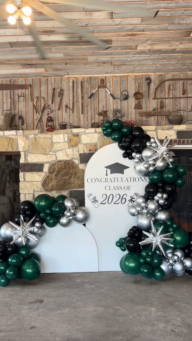 Emerald and silver graduation balloon arch by Lovely Pop Luxury Events