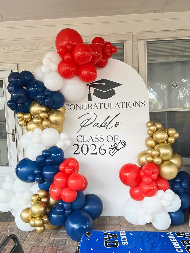 Graduation balloon arch and backdrop by Lovely Pop Luxury Events