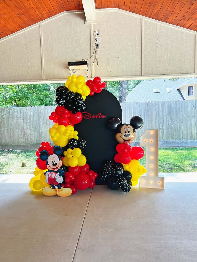 Mickey Mouse themed balloon column by Lovely Pop Luxury Events